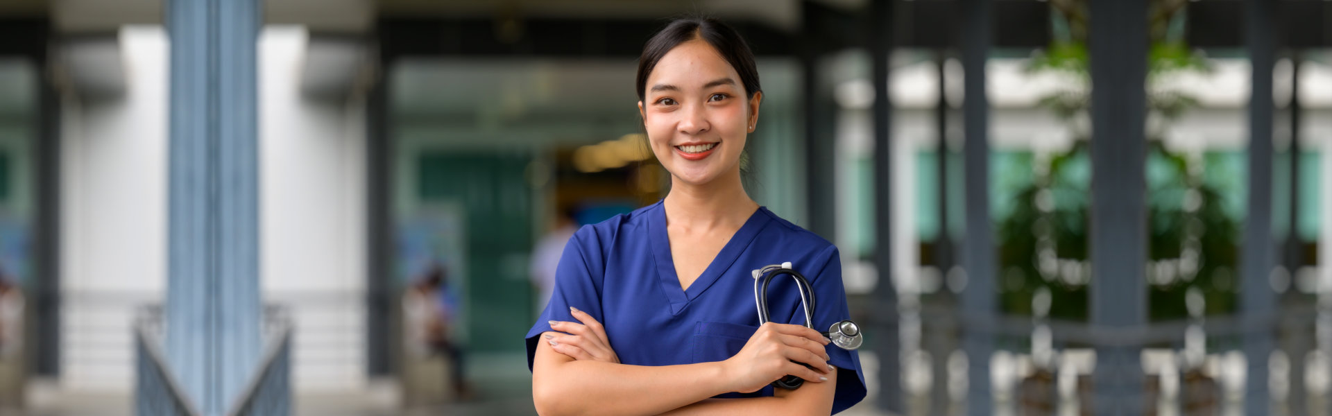Professional Asian woman nurse holding stethoscope